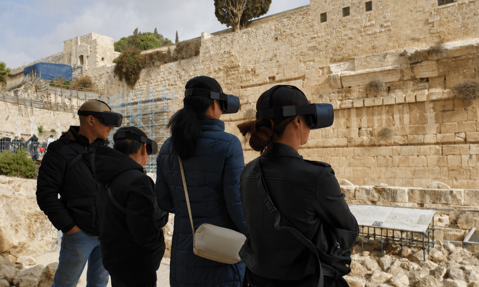 Visitors wearing XR headsets at a live heritage site deployment